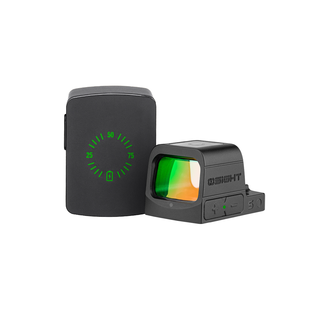 Compact black red dot sight with green lens next to its charging case displaying 50% battery.