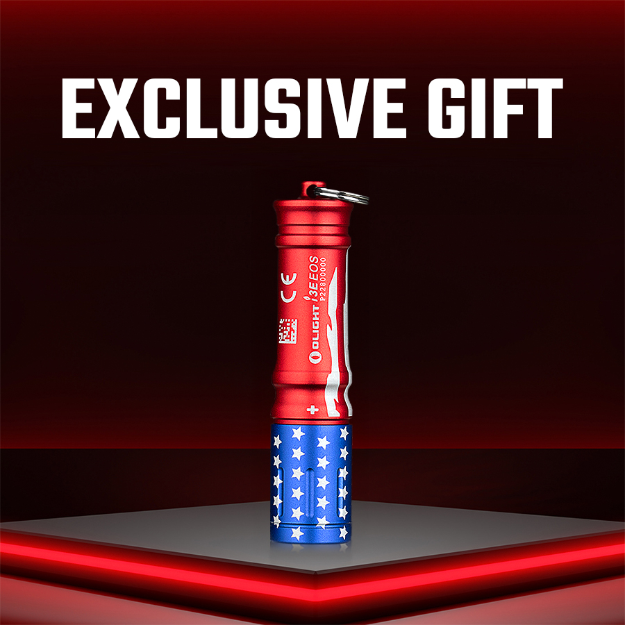 Olight I3E patriotic red, white, and blue keychain flashlight standing upright for everyday carry or exclusive gift.