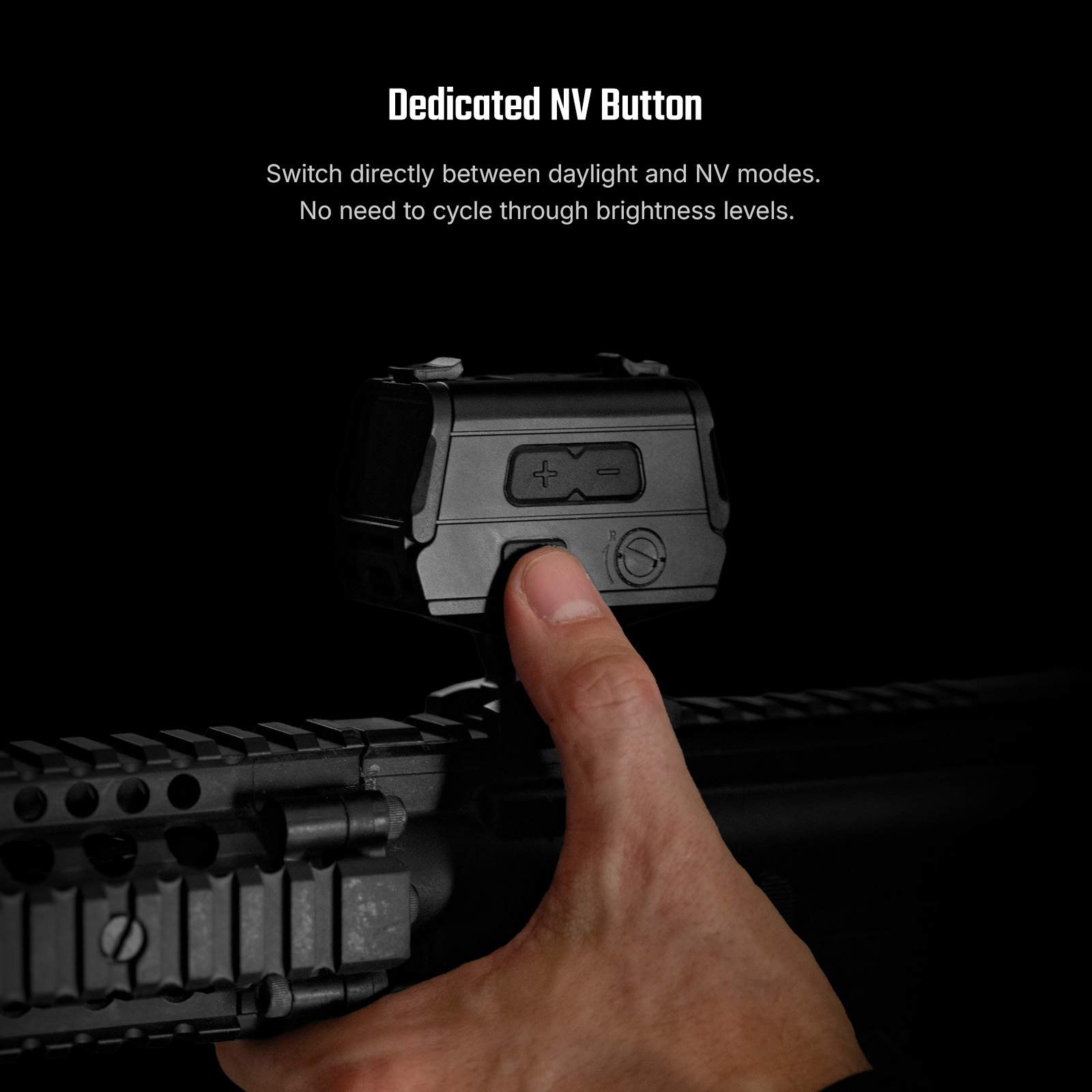 Finger pressing dedicated NV button on a black rifle red dot sight to switch between daylight and night vision modes